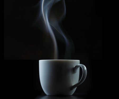 Coffee cup with steam coming out of the cup