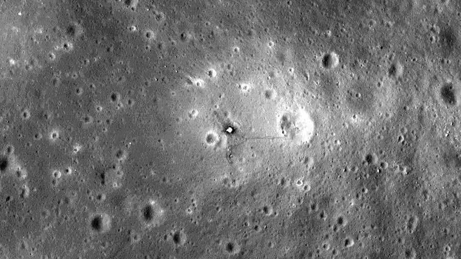 An image of the Apollo 11 lunar landing site, as captured by NASA’s Lunar Reconnaissance Orbiter. The lander is visible, as are trails of boot prints from the astronauts.