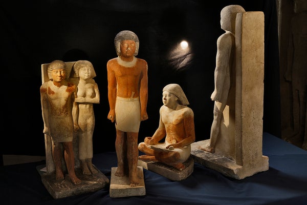 Ancient Egyptian statues of Nefer and his wife