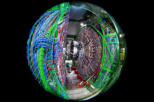 A photograph using a fish-eye lens shows the Compact Muon Solenoid (CMS) detector assembly in a tunnel of the Large Hadron Collider (LHC) at the European Organization for Nuclear Research (CERN)