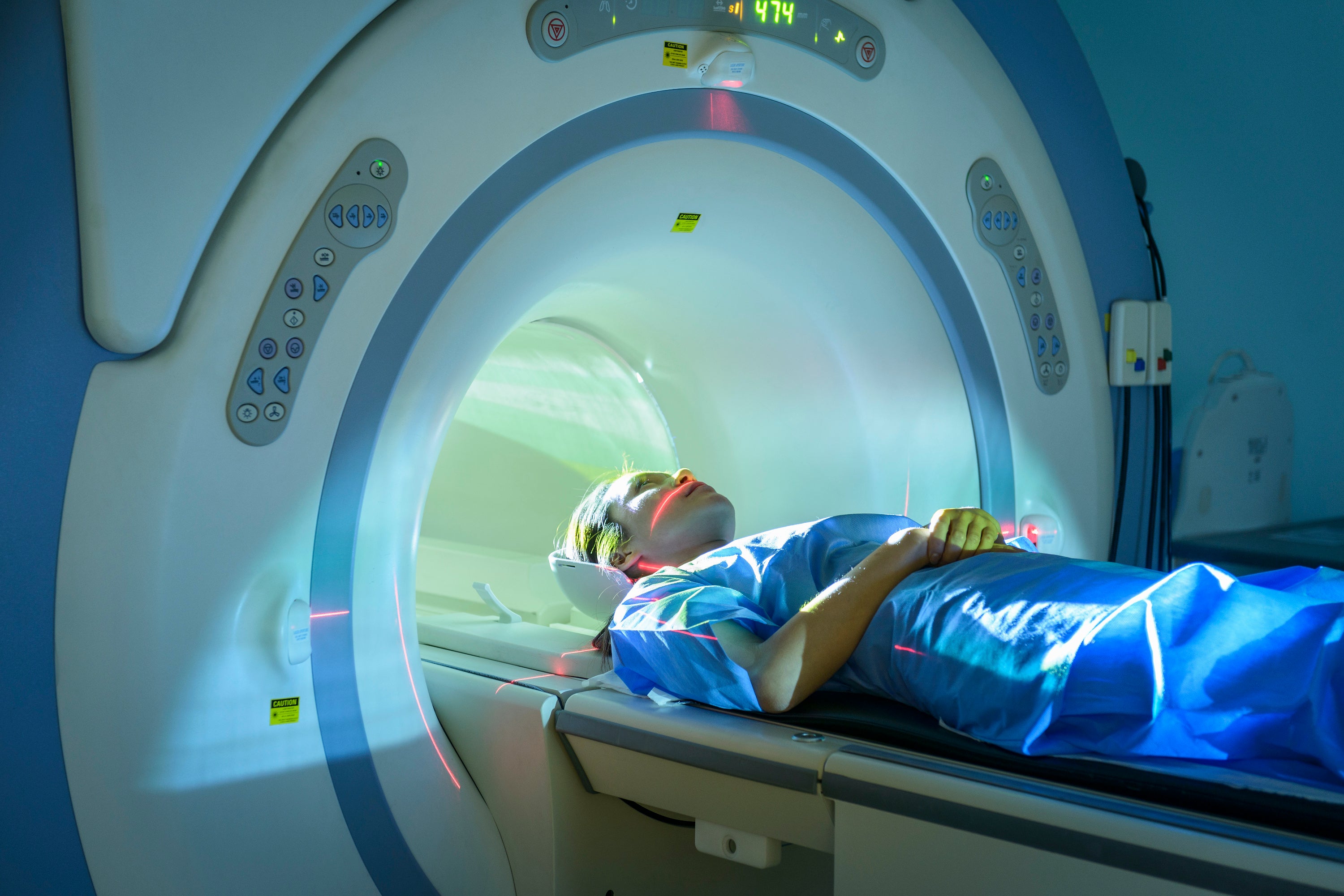 A patient enters a magnetic resonance imaging scanner
