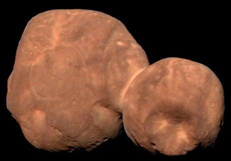 A smooth, reddish, asteroid composed of two spherical lobes joined by a narrow neck.