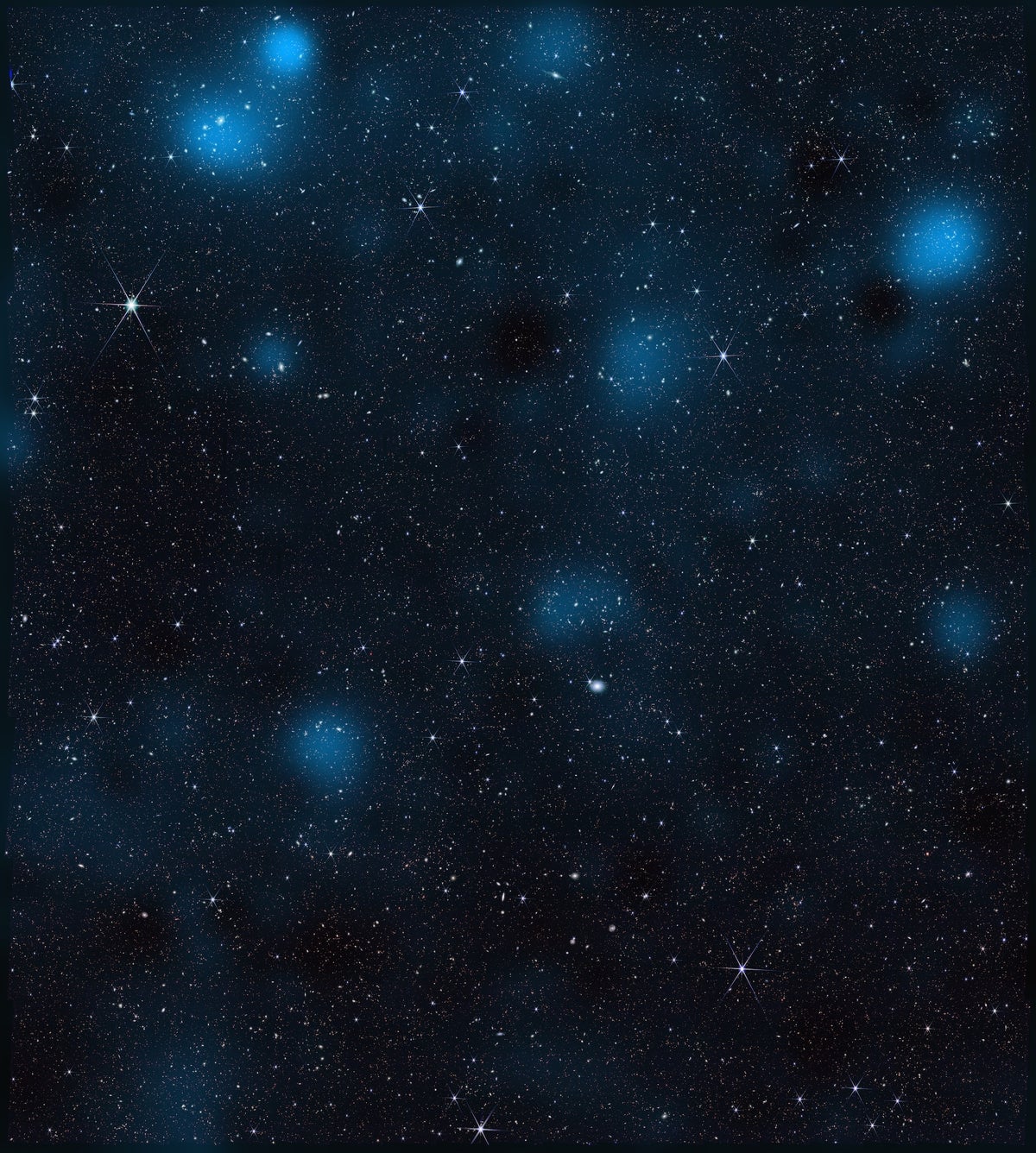 fuzzy blue clumps of dark matter dot a deep-space view of stars and distant galaxies