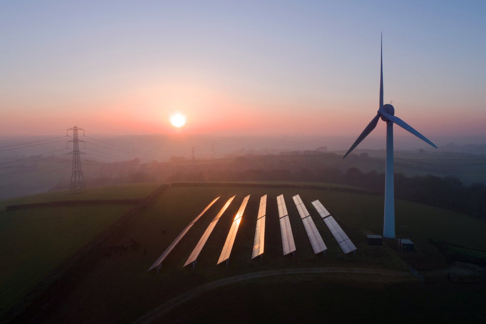 https://static.scientificamerican.com/dam/m/58a5f91c53f64491/original/Solar-panels-and-wind-turbines-in-field-at-sunset.jpg?m=1738596688.823&w=1000