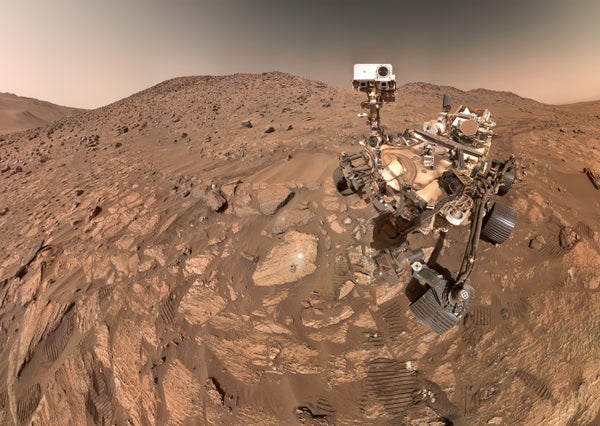 To the left of the rover near the center of the image is the arrowhead-shaped rock nicknamed "Cheyava Falls, " which has features that may bear on the question of whether Mars was home to microscopic life in the distant past. The small dark hole in the rock is where Perseverance took a core sample, which is now in a sample tube stored in the rover's belly. The white patch to the right of the hole is where the rover used an abrasion tool to clear away the top surface, allowing science instruments to study the rock's composition