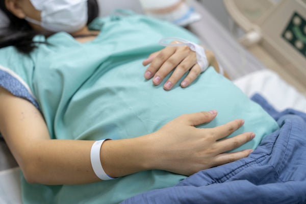 Woman waiting to give birth in hospital