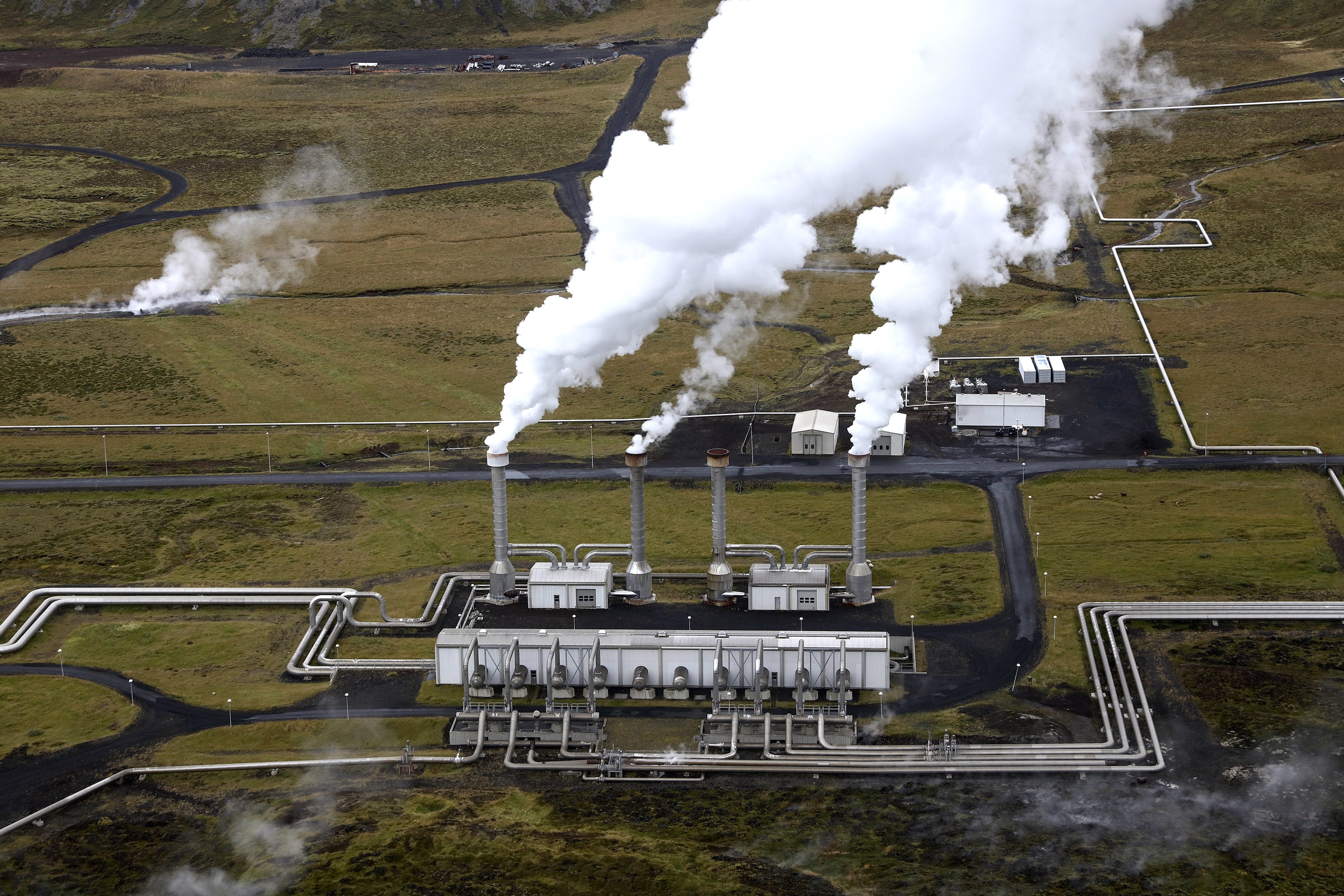 Vapour rises from cooling towers in the separation station at the Nesjavellir Geothermal power station.