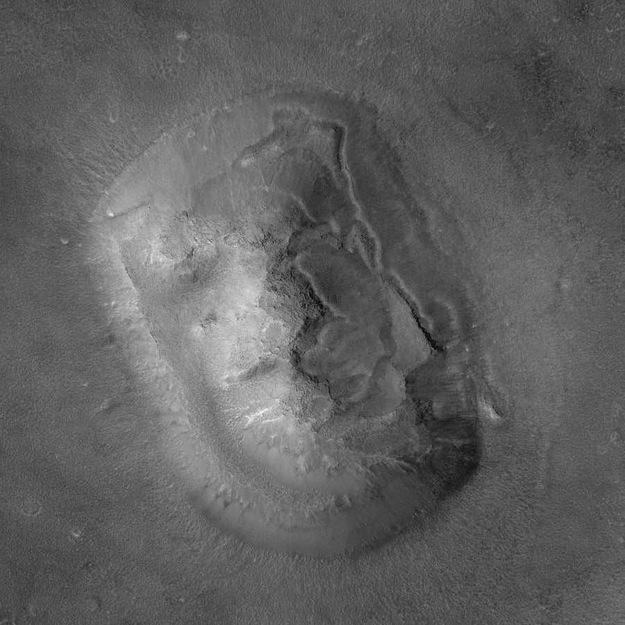 A high-resolution image of the same Cydonia landform that resembled a face in a 1976 image captured by the Viking 1 Orbiter. In this 2001 Mars Orbiter Camera image the large "face" covers an area about 3.6 kilometers (2.2 miles) on a side. Sunlight illuminates the images from the left/lower left