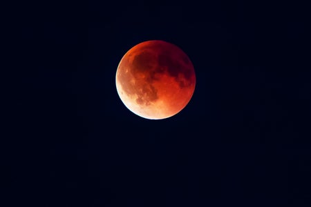 Total lunar eclipse shows the moon turned a red color