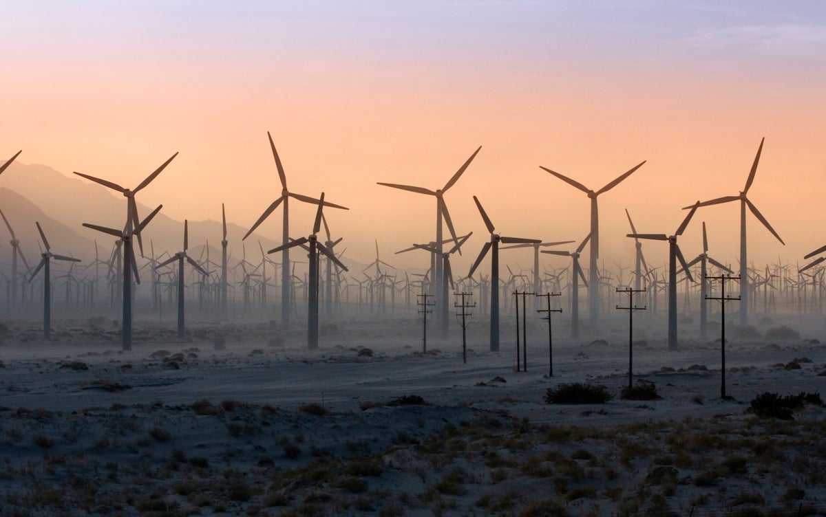 Wind turbines at dusk in the Palm Springs desert.