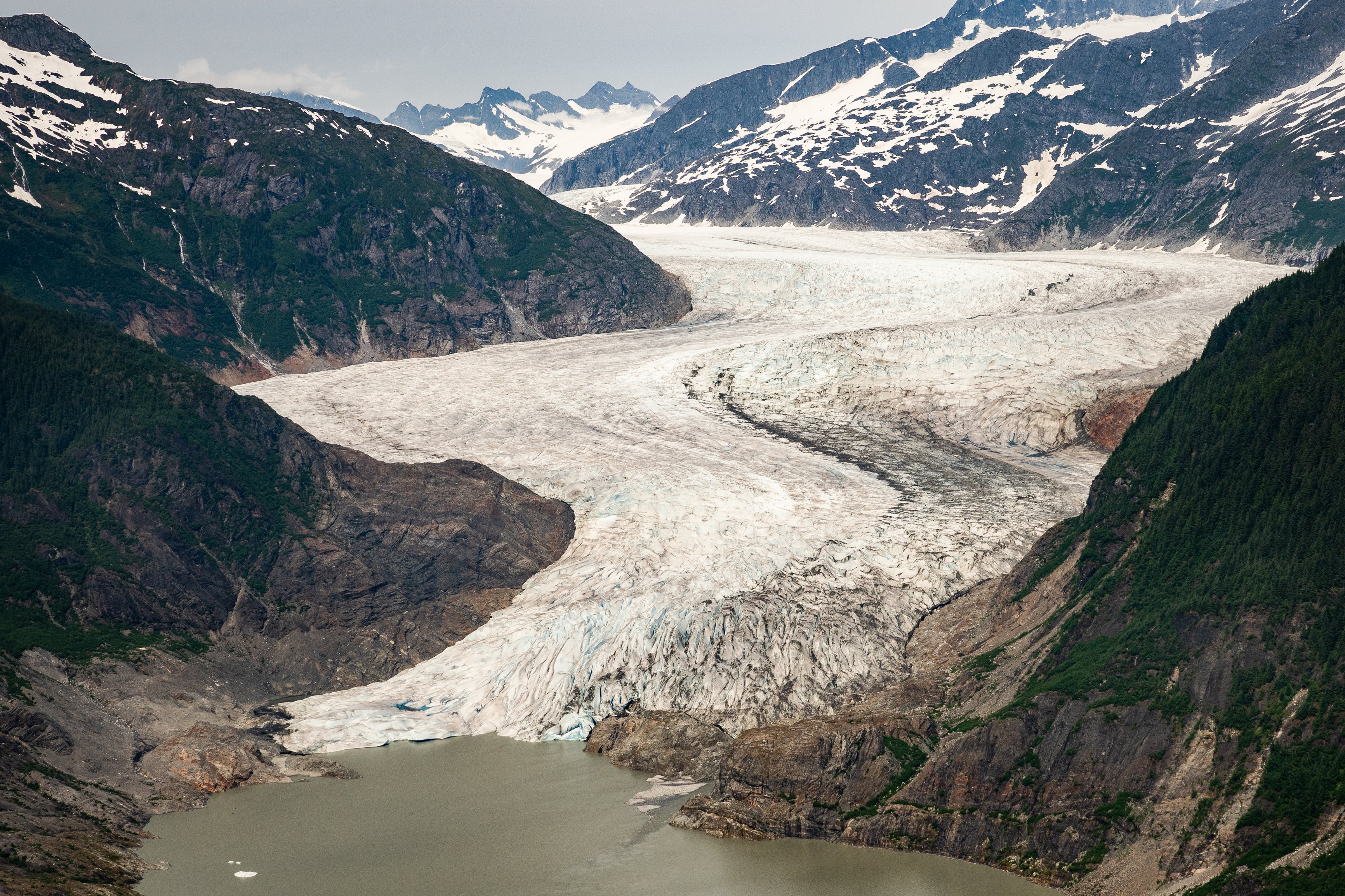 Glacier surrounded by mountains