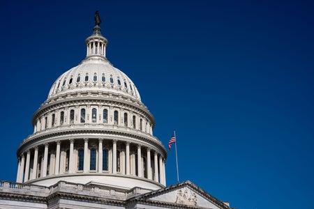 The dome of the U.S. Capitol under blue skies.