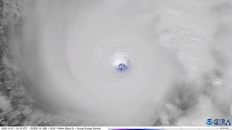 Lightning flashes within the eye of hurricane Melissa.