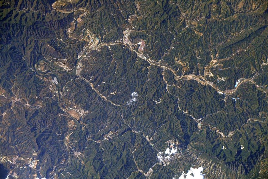 A portion of the Great Wall of China, as seen from low-Earth orbit via a telephoto lens