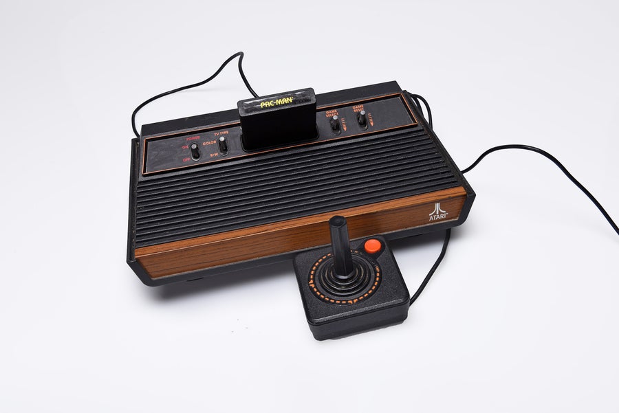 Atari game console and joystick with Ms. Pacman cartridge