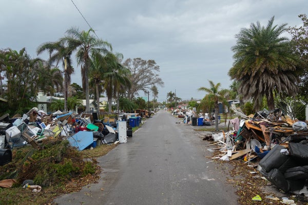 Street view of debris from Hurricane Helene