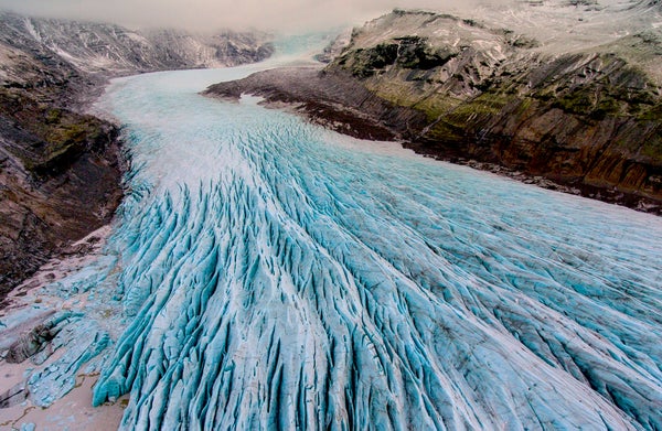 Blue glacier in mountain landscape