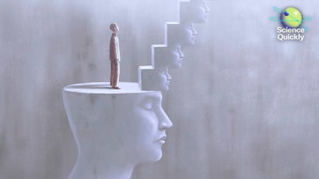 An illustration of a man standing on a platform carved out of a stone head with a staircase of smaller stone heads leading up towards a light