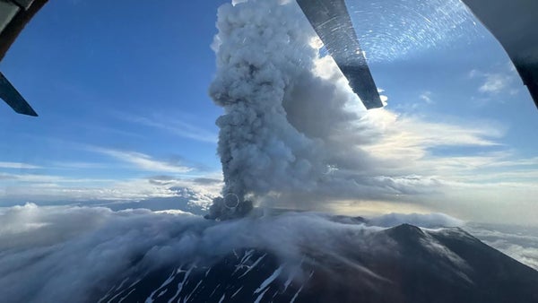 Aerial view of volcano erupting