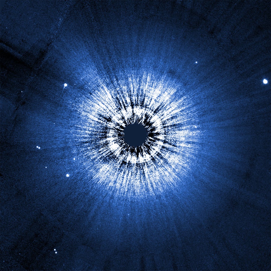 Hubble acquired this image of the circumstellar disk around the star Vega using the Space Telescope Imaging Spectrograph (STIS).