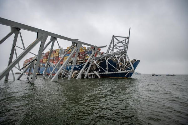 The container ship Dali is seen in the wreckage of Francis Scott Key Bridge a week after it hit a structural pier causing a catastrophic bridge collapse, on April 2, 2024.