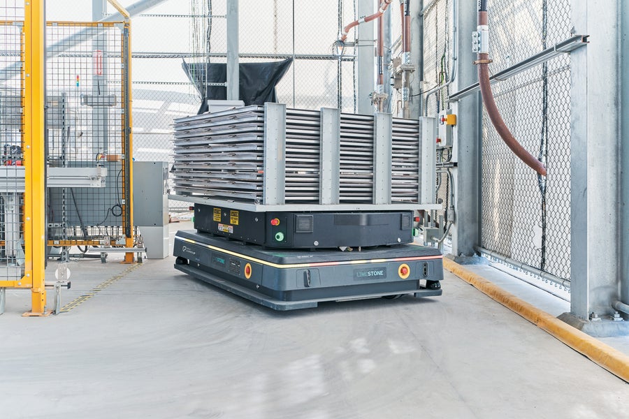 Robotic equipment delivering trays in a plant facility