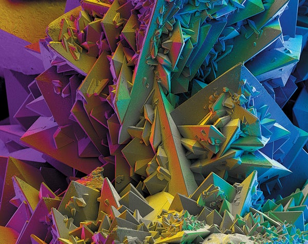 A microscopic view of colorized crystalized structure.