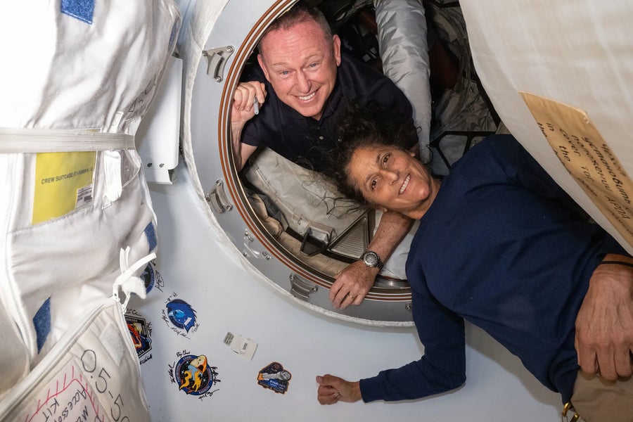 NASA’s Boeing Crew Flight Test astronauts (from top) Butch Wilmore and Suni Williams inside the vestibule between the forward port on the International Space Station’s Harmony module and the Starliner spacecraft