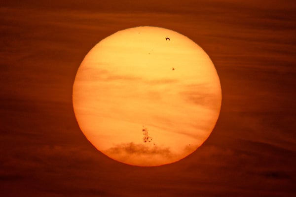 A photograph of the sun, with a large group of sunspots on its face