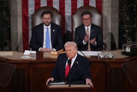 President Trump delivering State of the Union address as JD Vance and Mike Johnson look on