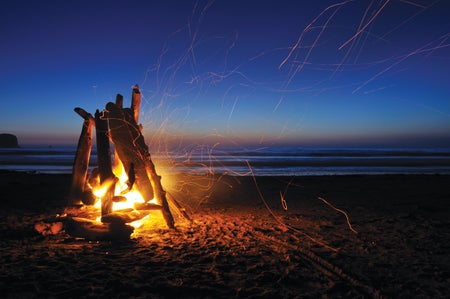 Human-made bonfire on a beach
