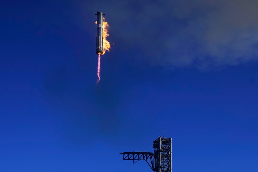 SpaceX's Starship "Super Heavy" booster returns to the launchpad during a test flight from Starbase in Boca Chica, Texas, on Jan. 16, 2025.