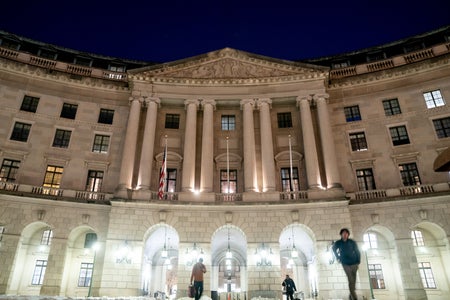A large columned gray building
