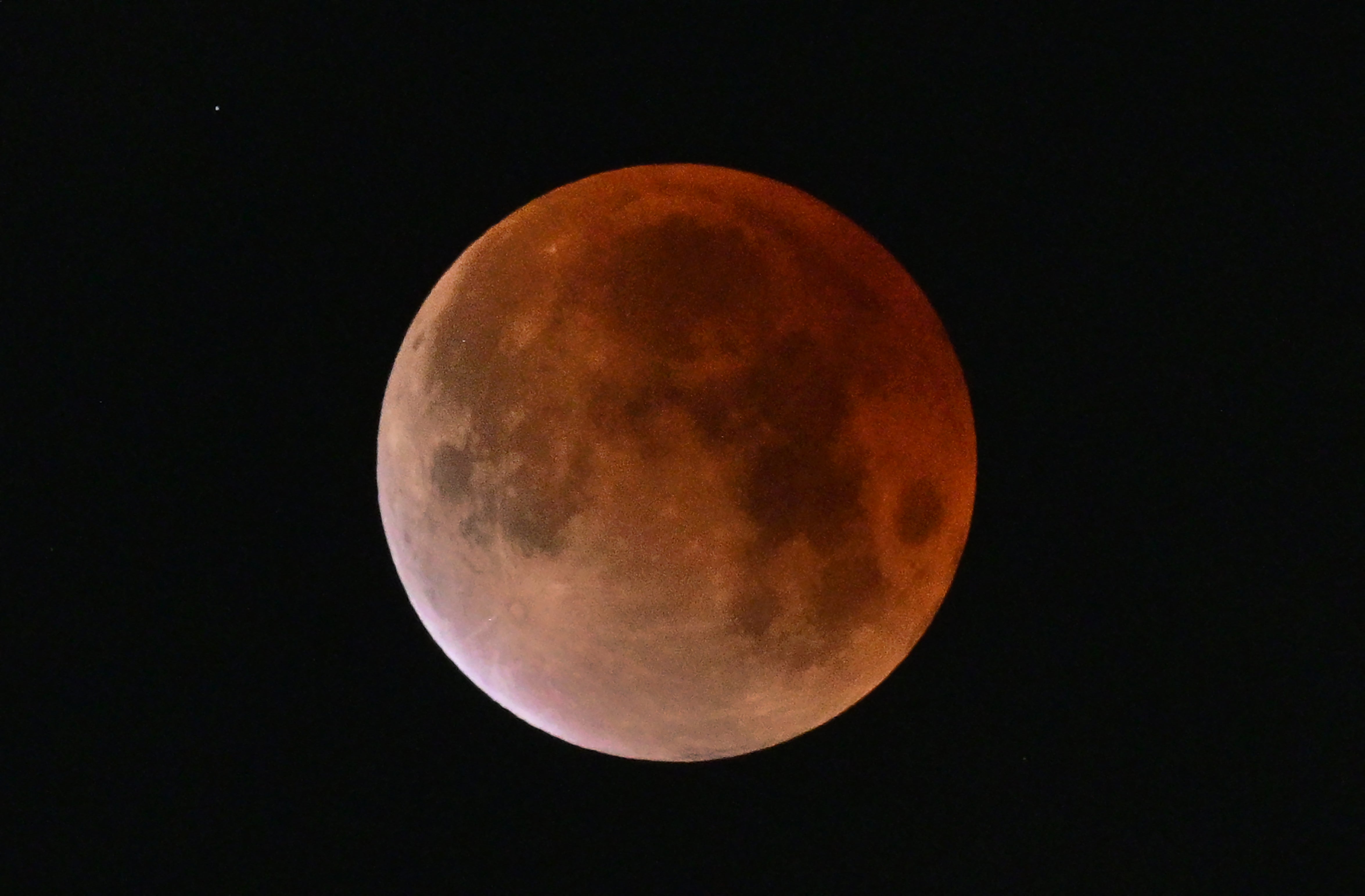 a dark red moon