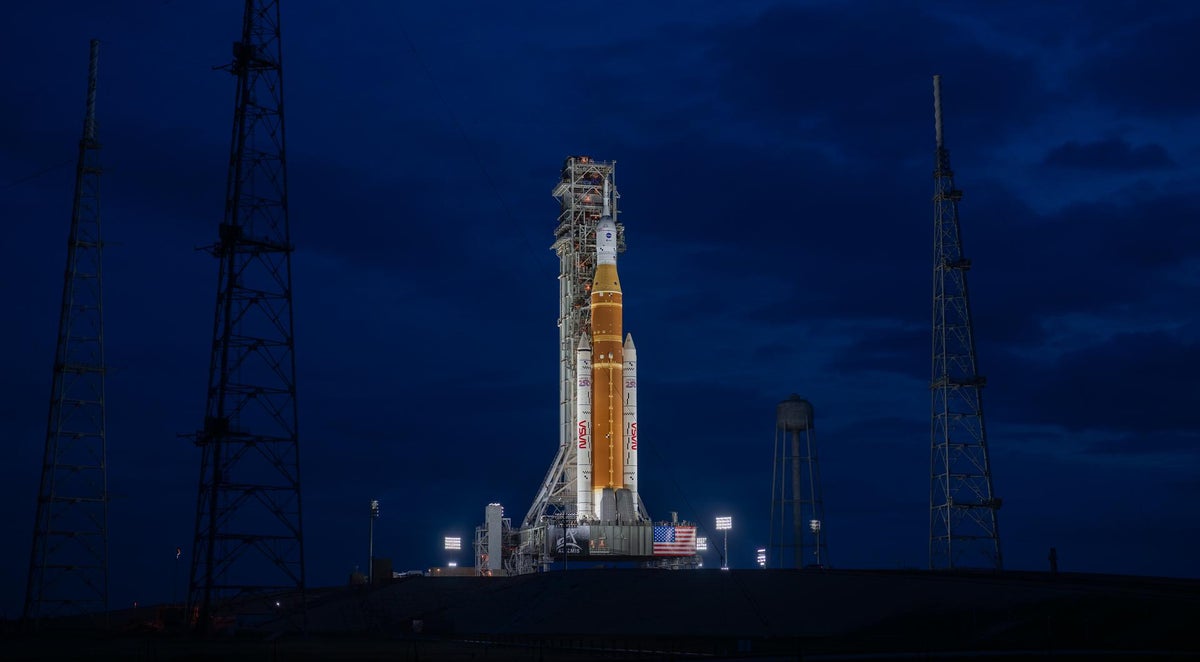 Lights illuminate NASA's Artemis II SLS (Space Launch System) rocket and Orion spacecraft at Launch Complex 39B at NASA's Kennedy Space Center in Florida on January 18, 2026.