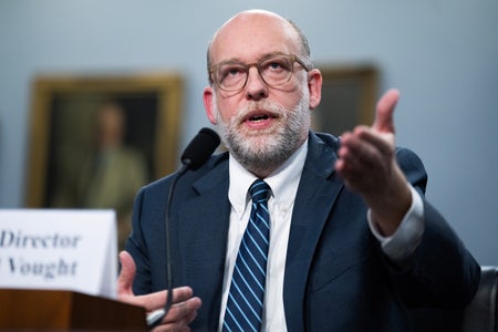 OMB Director Russell Vought sitting and speaking into a microphone while testifying before the House Appropriations Committee in the Rayburn building on June 4, 2025.