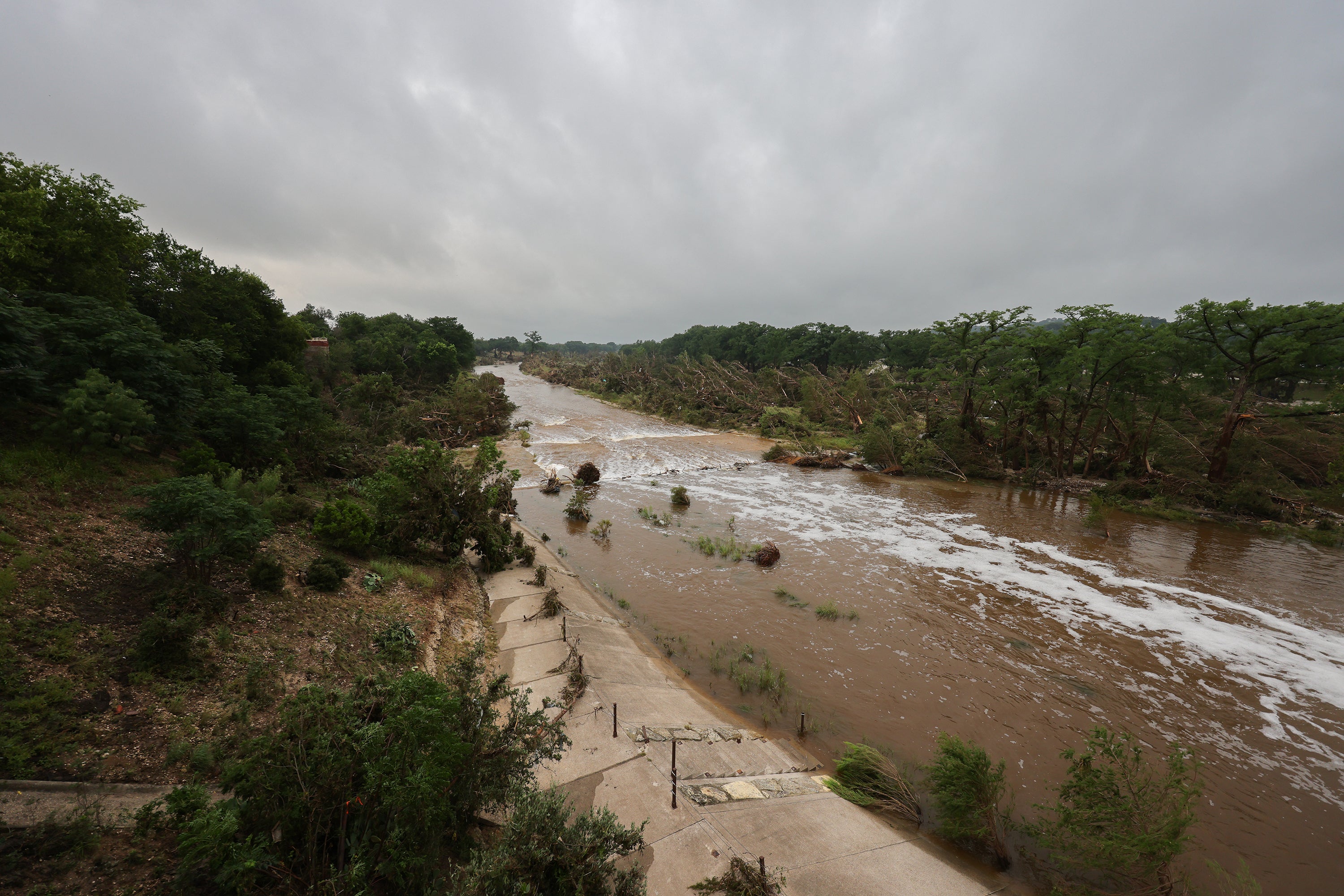 Scattered debris near flooded river
