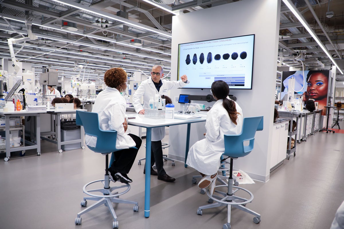 Three researchers in a lab