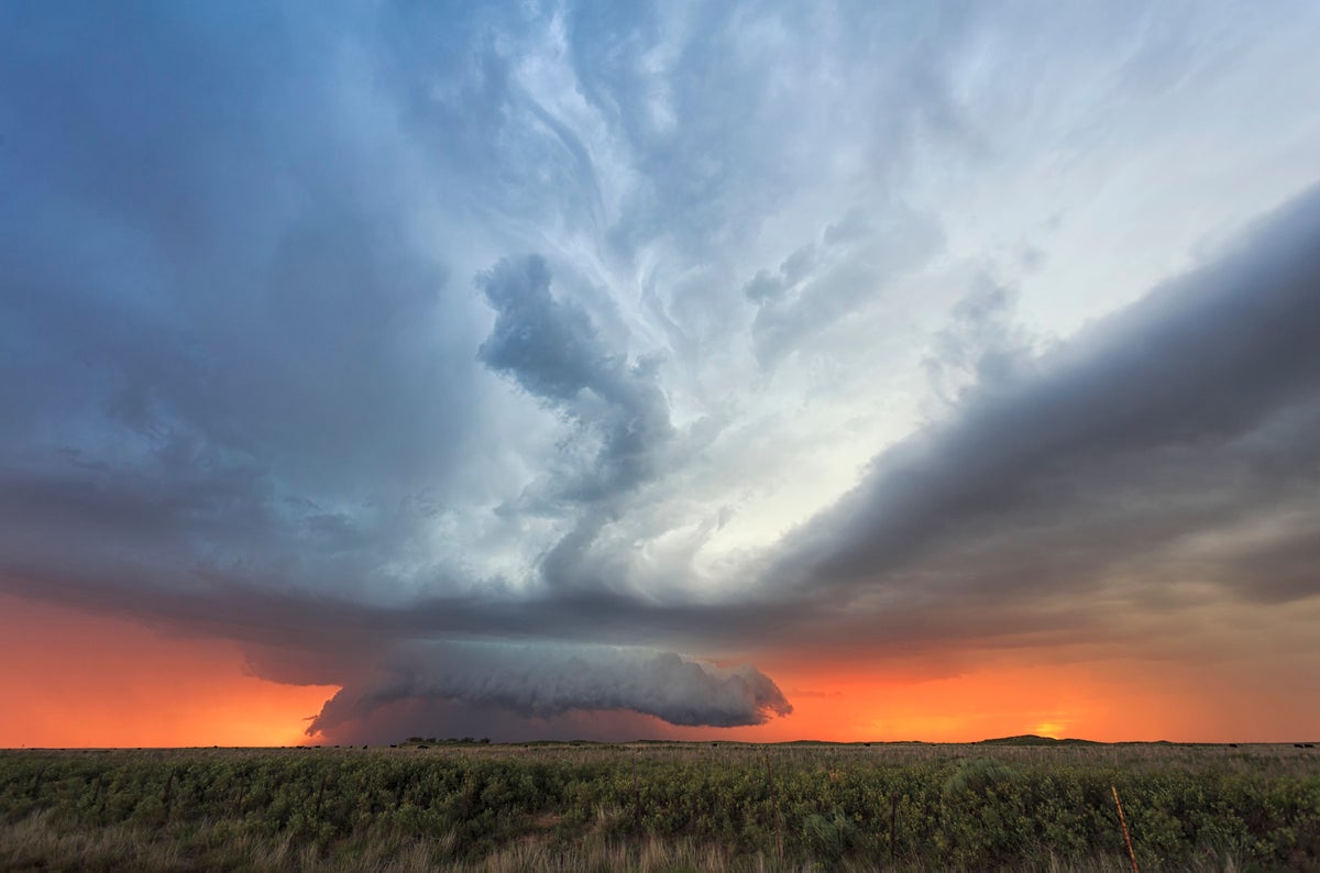 A supercell mushrooming during sunset in Bledsoe, Texas. 