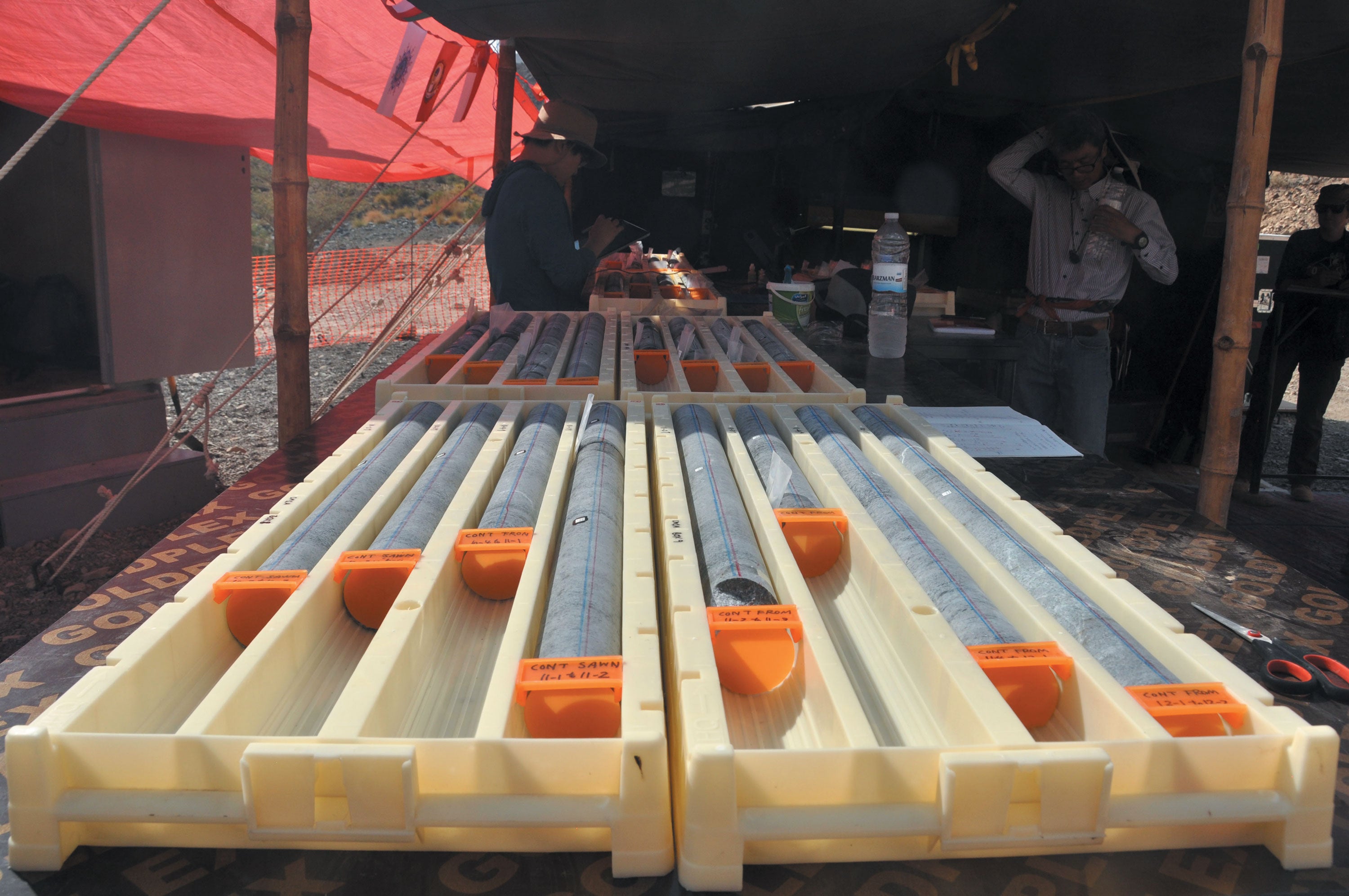 Big gray tubes holding samples to be tested.