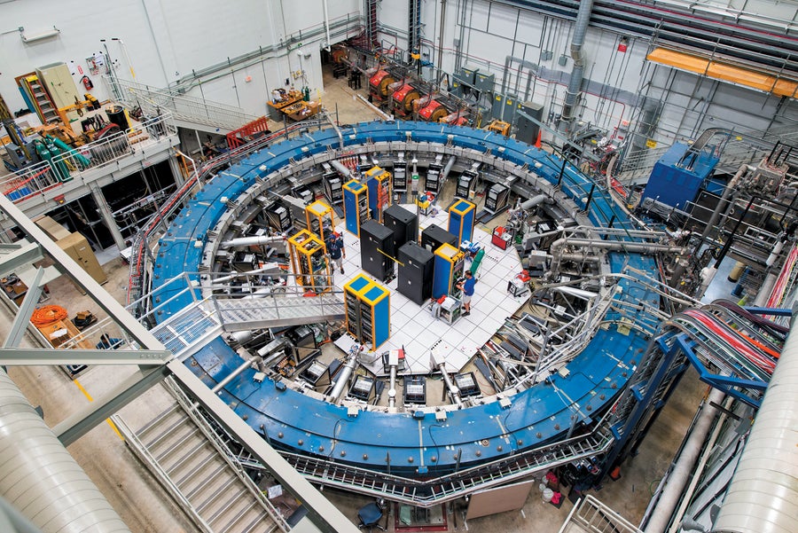 Particles circle around a 50-foot-diameter ring in the Muon g-2 experiment.