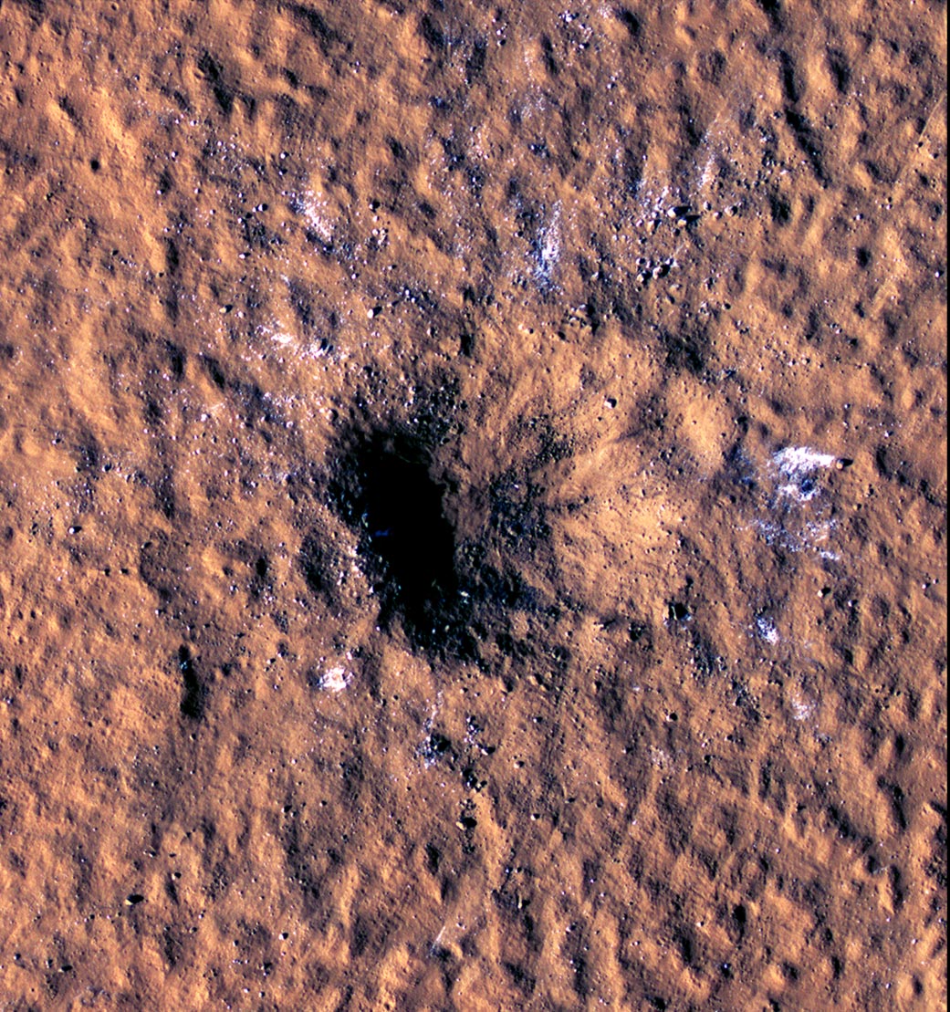 Freshly formed 150-meter-wide impact crater in the Red Planet’s Amazonis Planitia region.