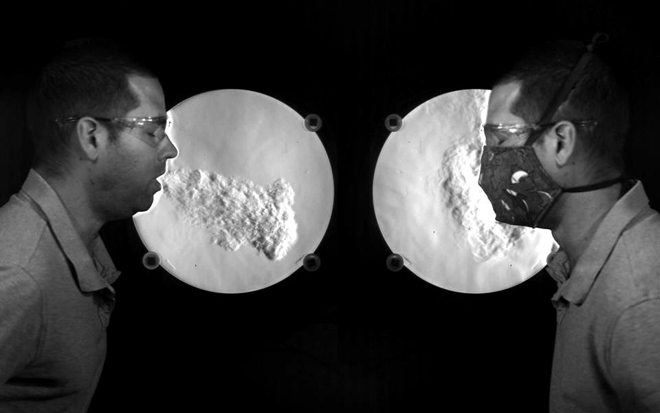 Matthew Staymates of the National Institute of Standards and Technology coughs with and without a mask while using an imaging technique to visualize how air travels after it leaves his mouth.