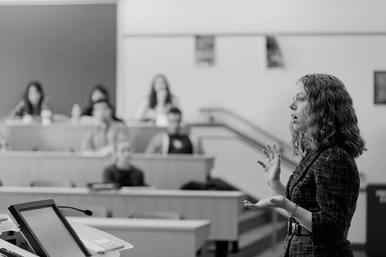 Woman speaking to an audience.