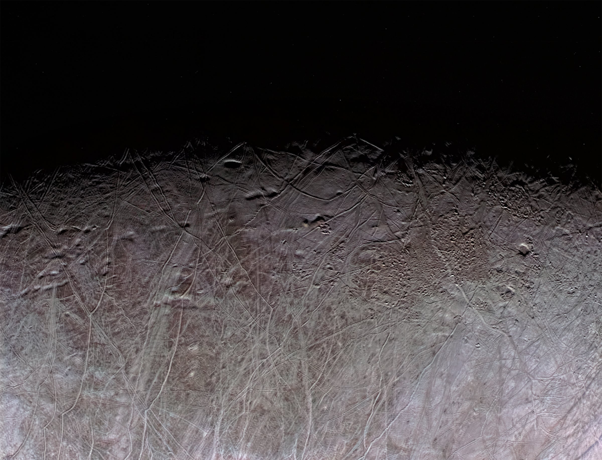 Shadows along the terminator, or day-night boundary, help to reveal some of Europa's distinctive surface features, such as fractures and pits, and indicate that the moon is geologically active.