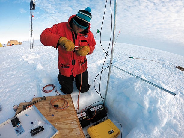 Martin Truffer sets up an instrument station to record the shelf's advancement and upheaval for two years.
