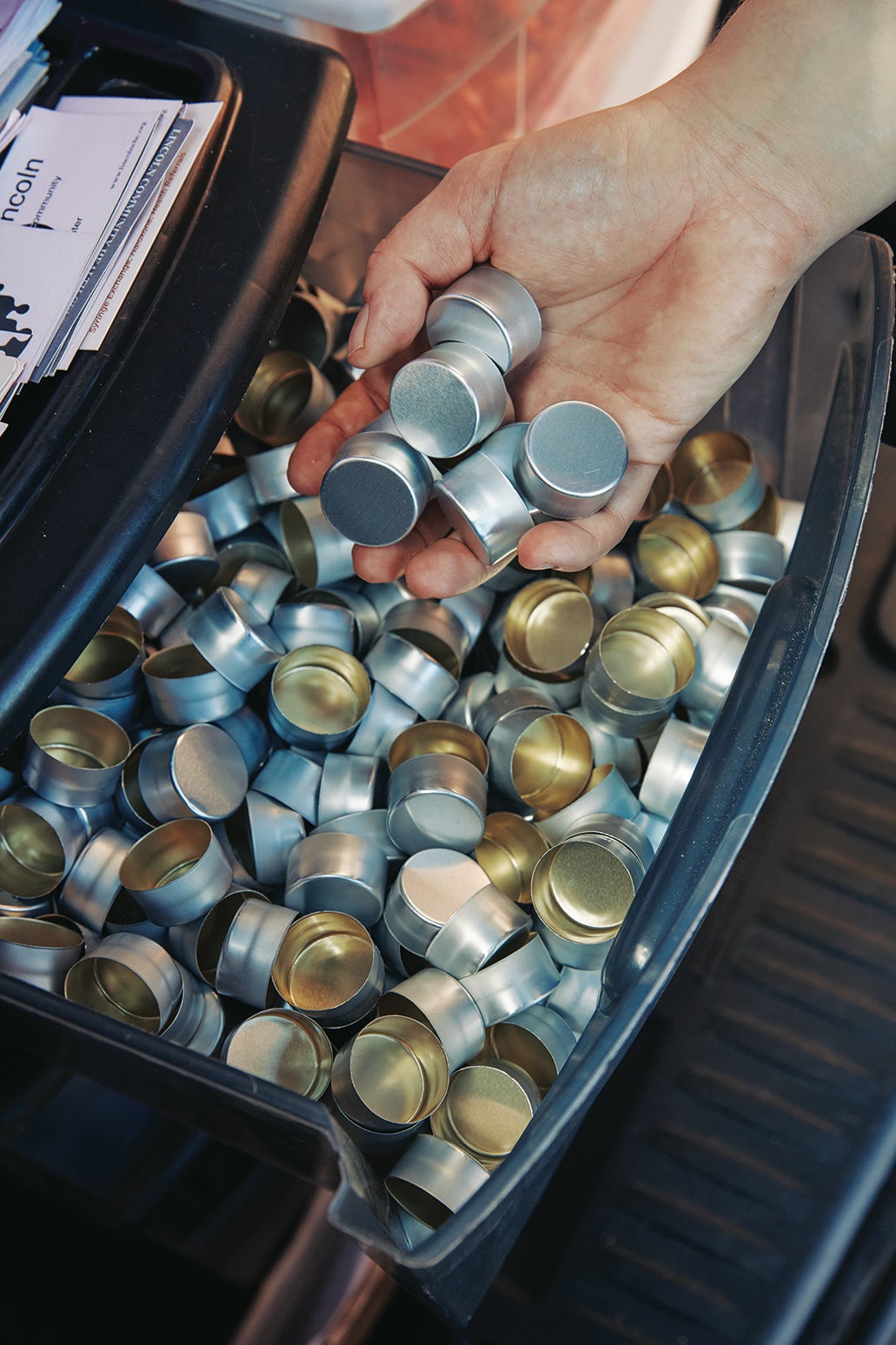 Drawer full of single-use cookers for drug injections.