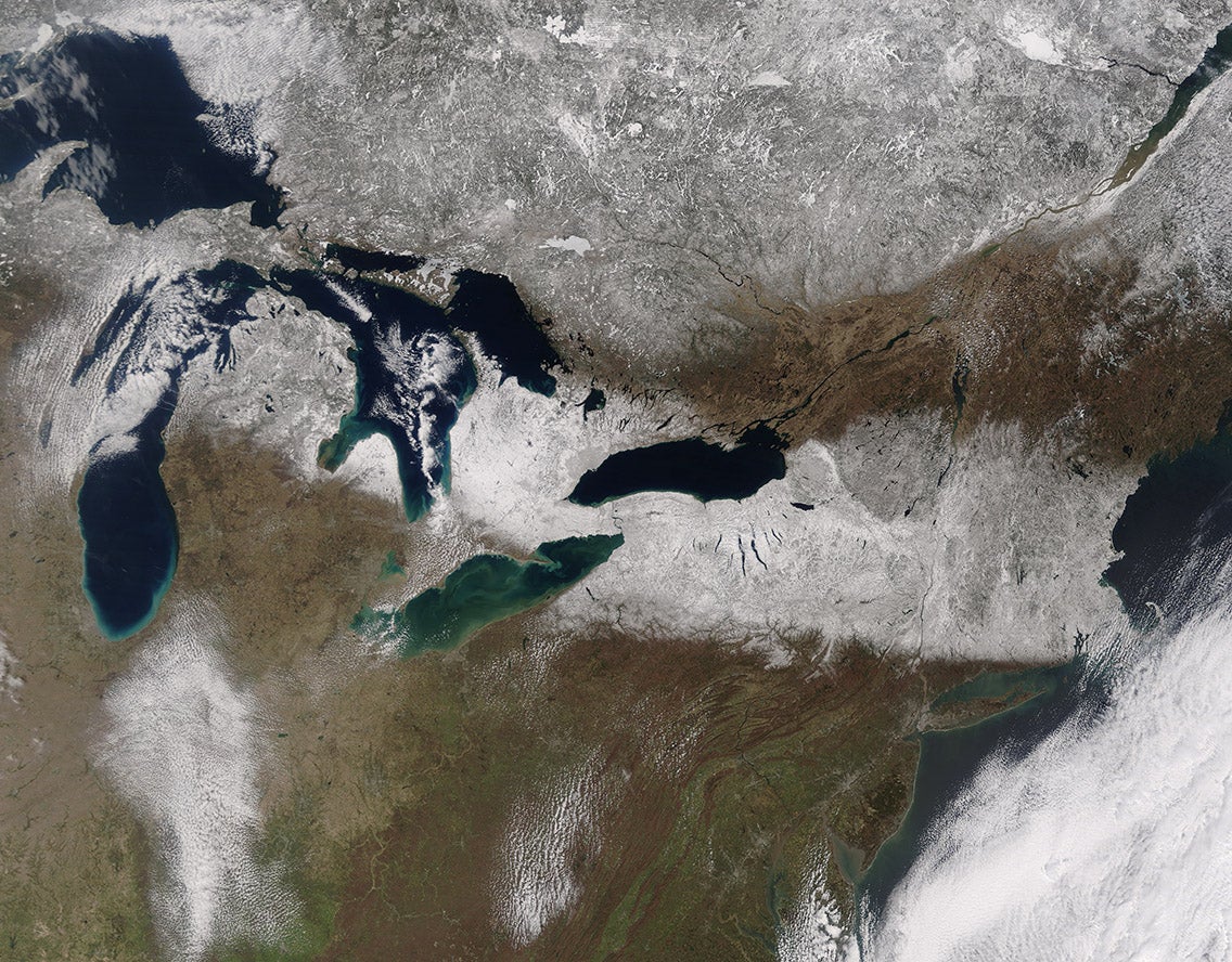 A fast-moving Alberta clipper drops snow across the U.S. Upper Midwest and Northeast. 