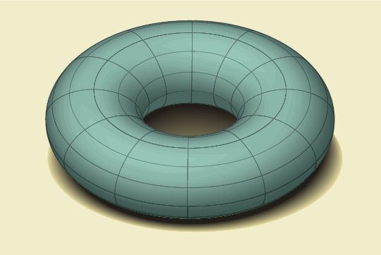 Drawing of a dimensional torus appears similar to a blue doughnut sitting on a tan tabletop.
