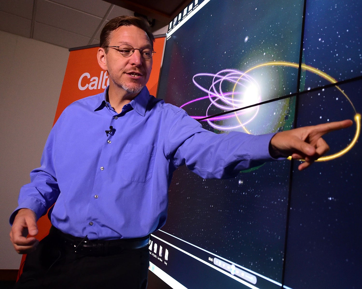 Mike Brown points out the Predicted Orbit of the 9th Planet at the Caltech Seismology Lab